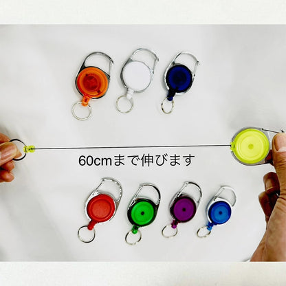 丸形リールキーホルダー カラビナ付 全10種（ホワイト・レッド・ブルー・イエロー・グリーン・オレンジ・ネイビー・パープル・ピンク・ブラック）【100個】
